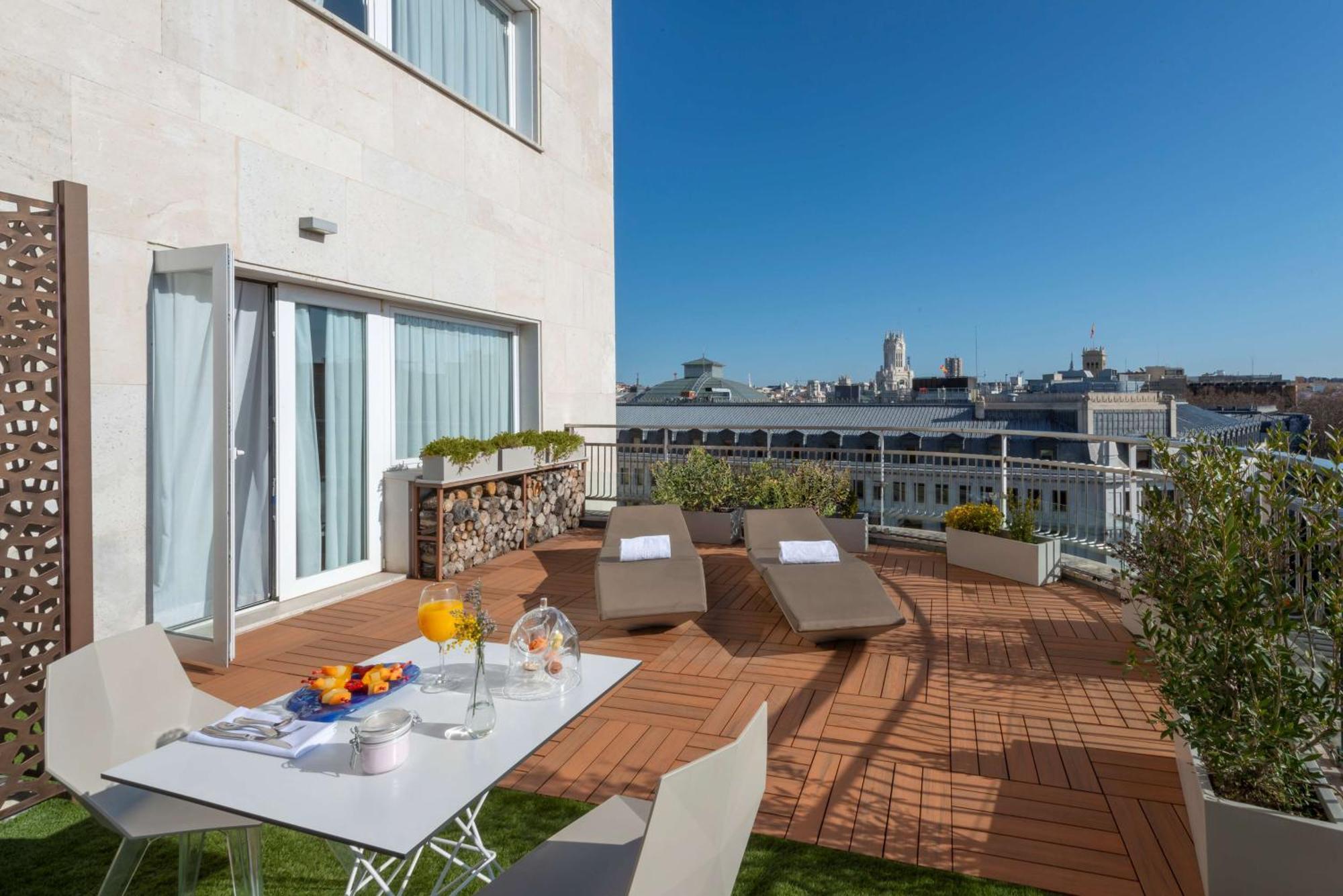 Nh Collection Madrid Suecia Hotel Exterior photo The hotel's rooftop terrace